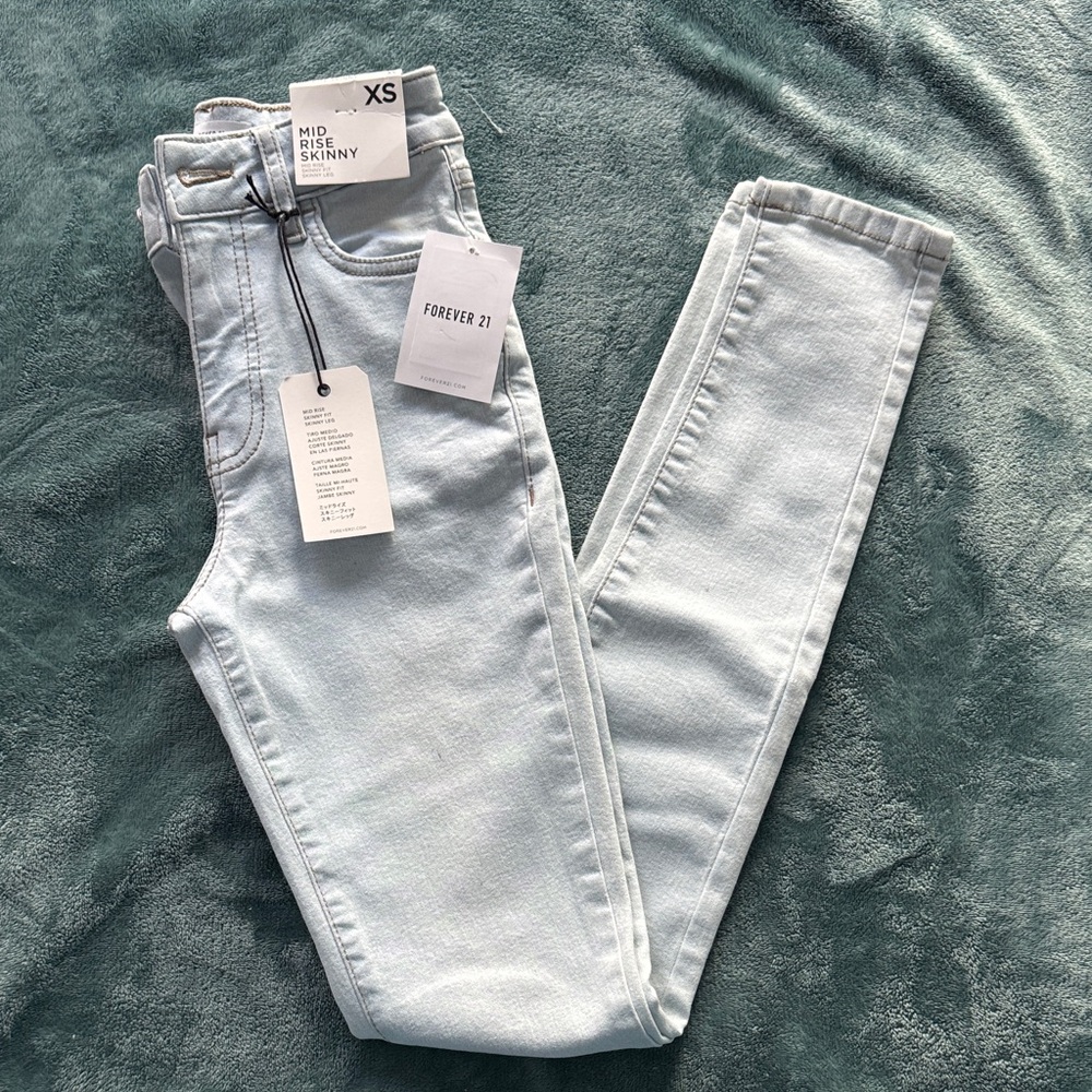 Forever 21 Mid Rise Light Wash Skinny Jeans